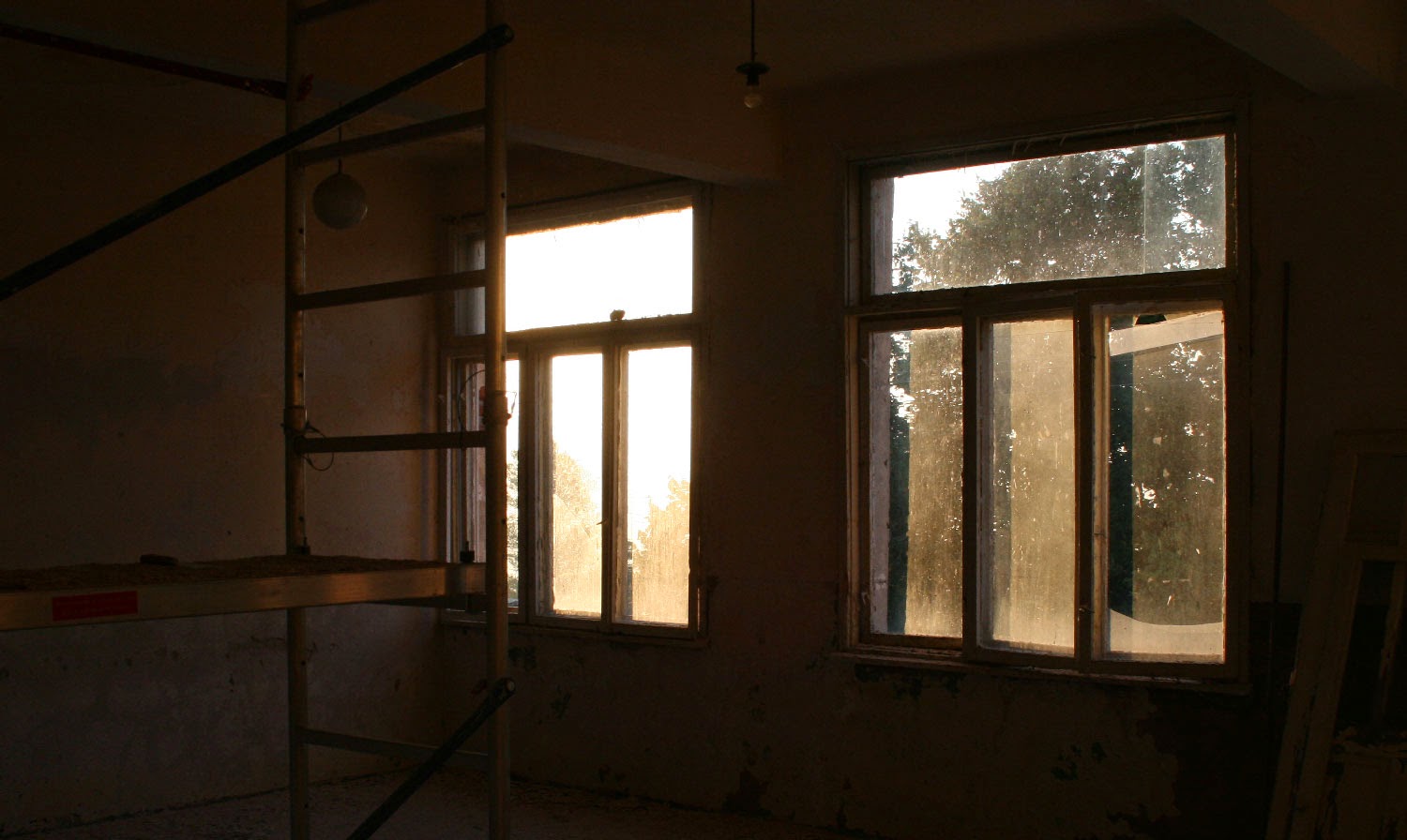 Morning sun through store room windows Morning sun through store room windows