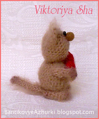 Связанный спицами котик Связанный спицами котик