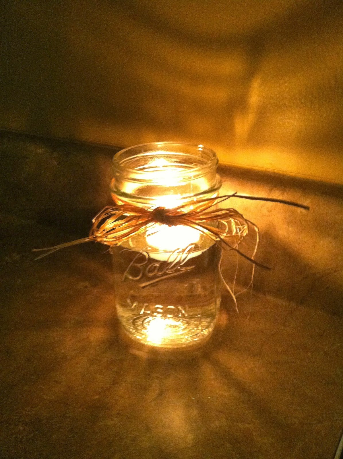 DIY Why Spend More Ball jars as candle holders