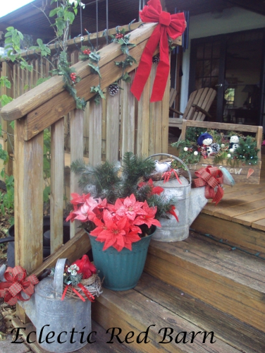Decorated Steps with Vintage Watering Cans and Poinsettias Decorated Steps with Vintage Watering Cans and Poinsettias