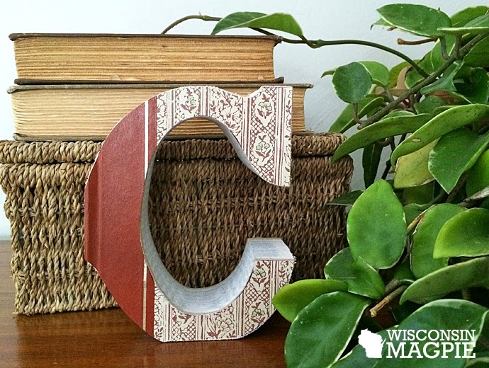 letter cut from book