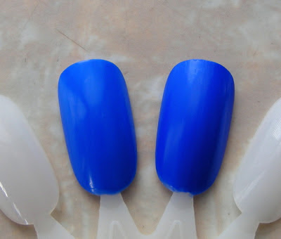 Swatches of Sally Hansen Xtreme Wear in Pacific Blue and Essie Butler Please.