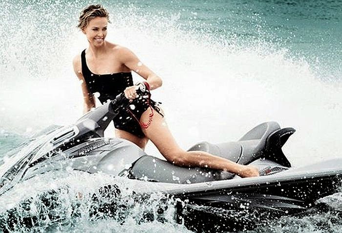 Charlize Theron shows off her easy way of love on June 2014 Issue of Vogue Sure enough, the 38-year-old looks pretty content in a grey bikini for June 2014 edition of Vogue Magazine after her lengthy trip for Mario Testino camera on Thursday, March 20, 2014.