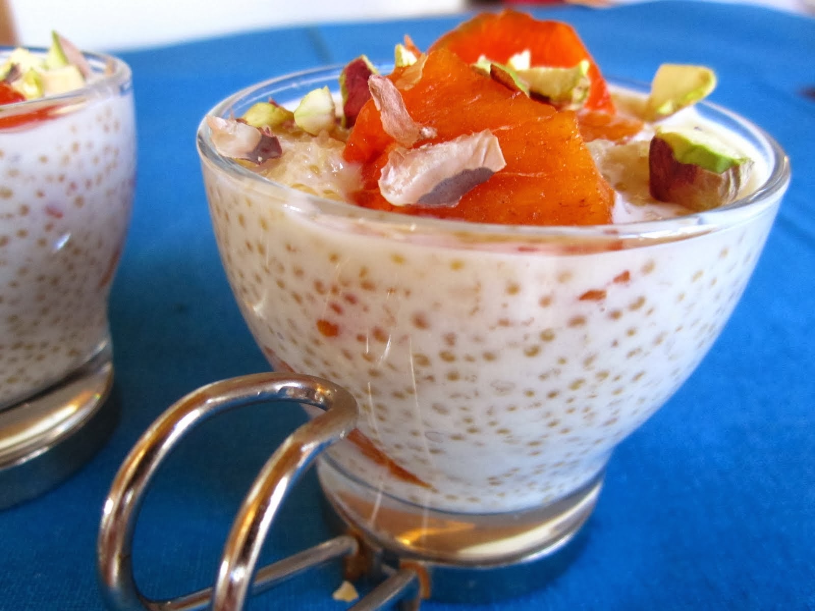 Quinoa Pudding with Orange Blossom Water, Persimmon and Pistachios