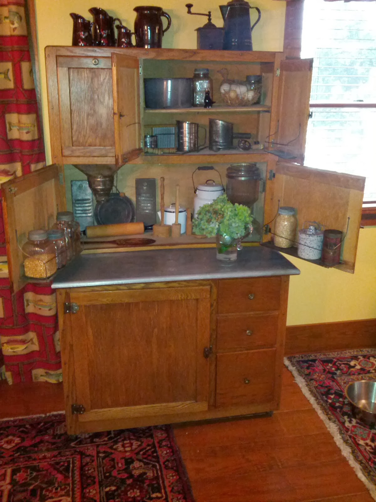 This Hoosier cabijust HAD to move upstairs to Cheryl's kitchen title=