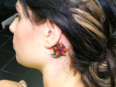 behind ear flower tattoo