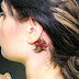 Tattoo behind ear-short and sweet