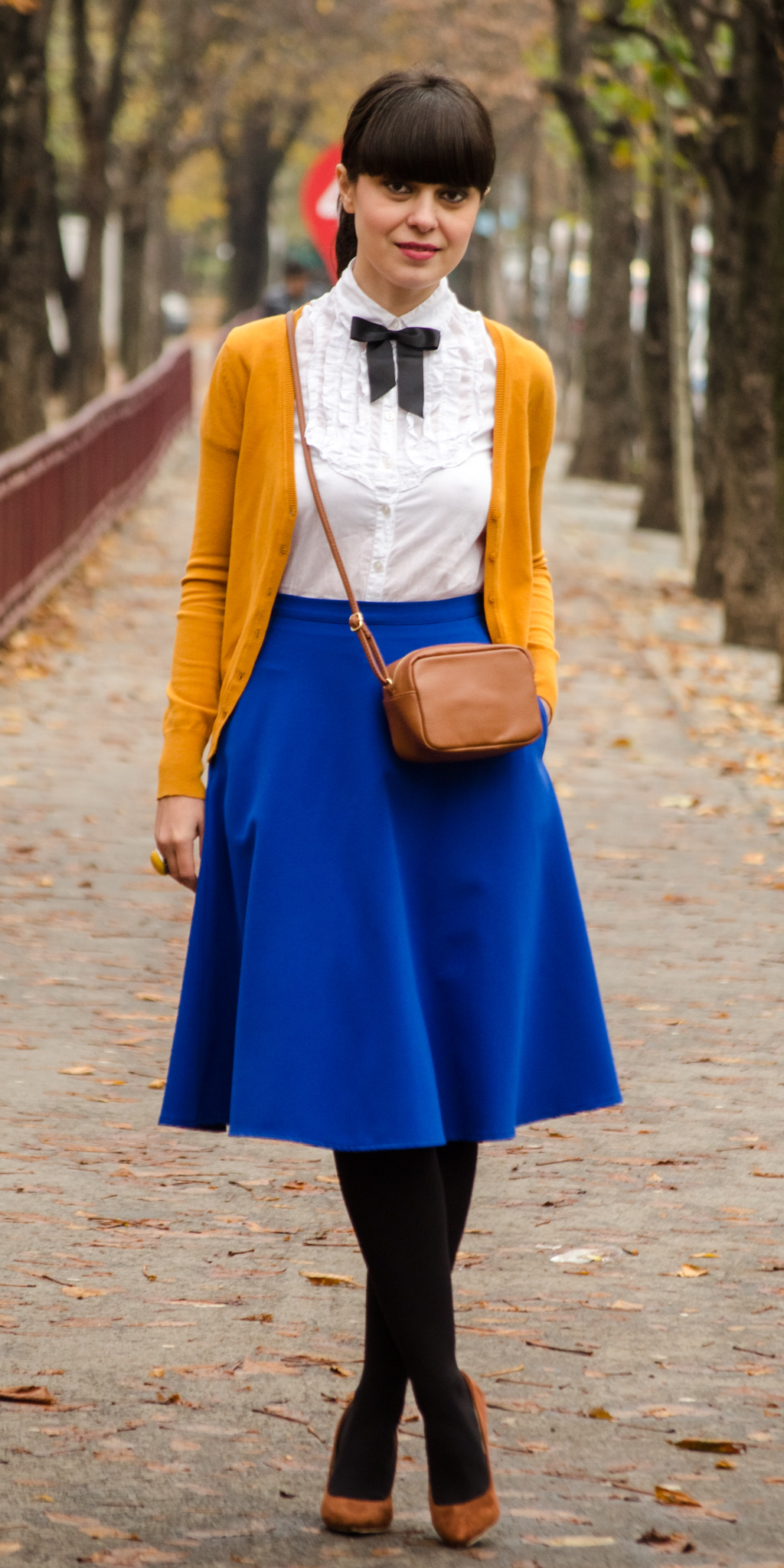 preppy school outfit mustard sweater cobalt blue skirt brown high heels brown satchel h&m c&a poema