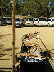 Method of barbecue at restaurants outside Kuang Si waterfalls.