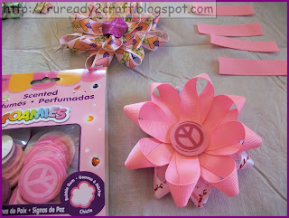 bottom of ribbon loops attached to circle foam circle used at center of ribbon loops
