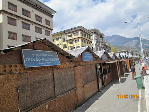 Row of handicraft shops known as "CRAFT BAZAR" on Norzim Lam Road.