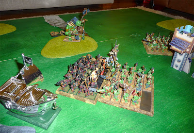 A Warhammer Fantasy Battle Report between Warriors of Chaos and Savage Orcs.