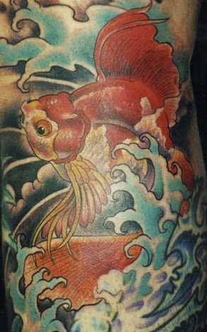 domino goldfish tattoo. 2010 japanese goldfish tattoo.