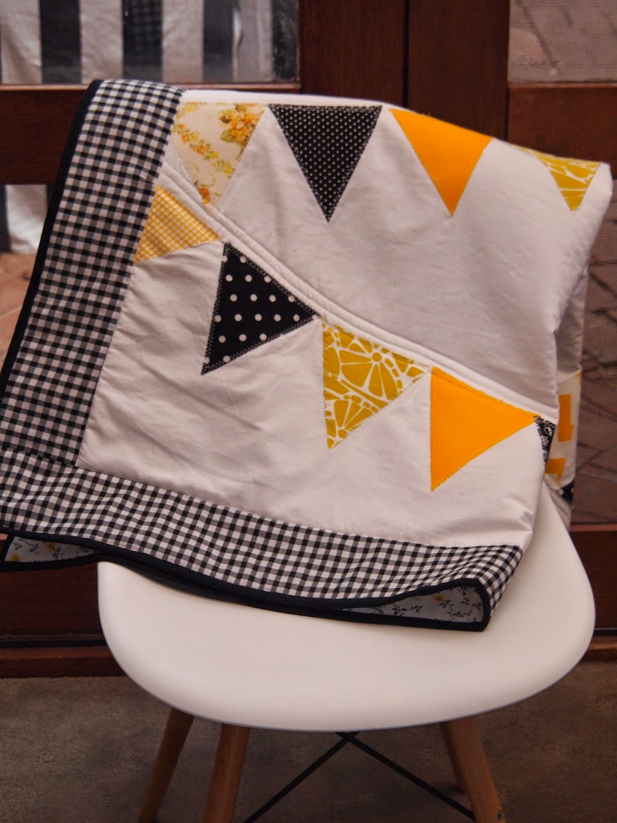 THE THRIFTY CHALLENGE A pennant quilt.