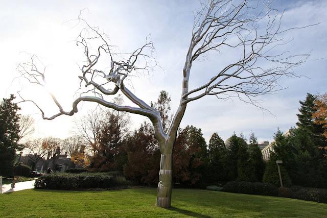 A look alike tree, made of steel can be seen outside of National Gallery of Art in Washington DC, USA A look alike tree, made of steel can be seen outside of National Gallery of Art in Washington DC, USA