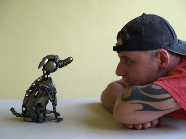 steampunk sculptures from old car and motorcycle parts