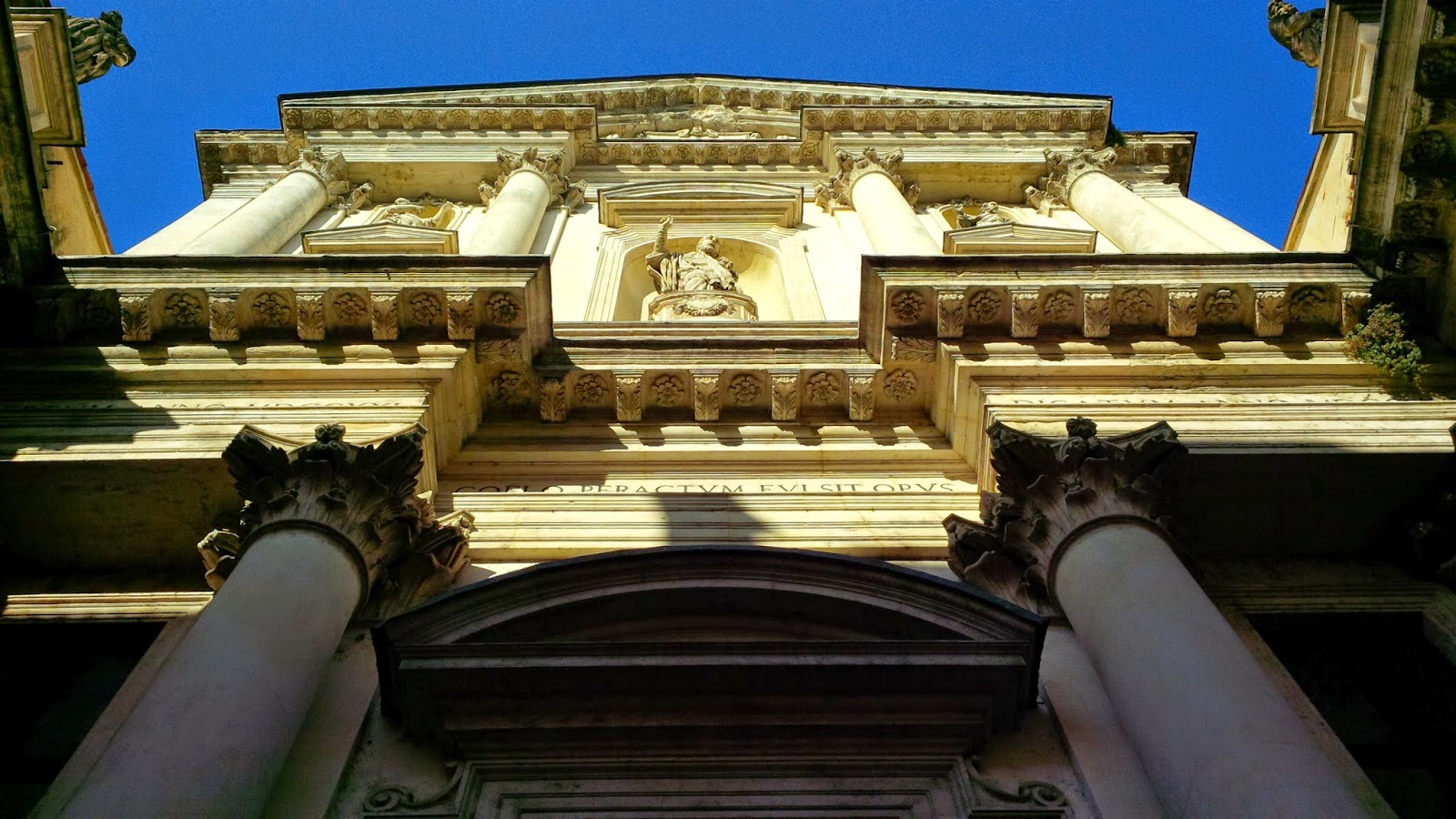 The sun lights up the facade of a church in Vicenza