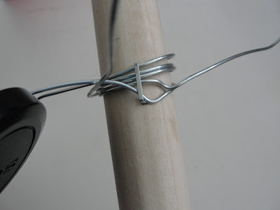 wire stapled to dowel for wind vane activity for kids