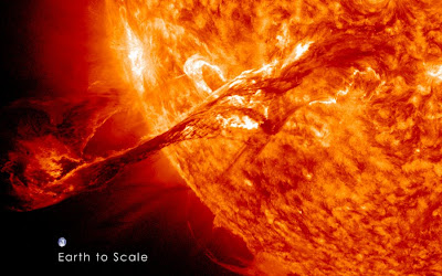 An extremely long solar filament shoots out from the sun on Aug. 31, 2012. The coronal mass ejection traveled at over 900 miles per second. The image also shows an image of Earth in the lower-left hand corner that shows the size of flare compared to the size of our planet.