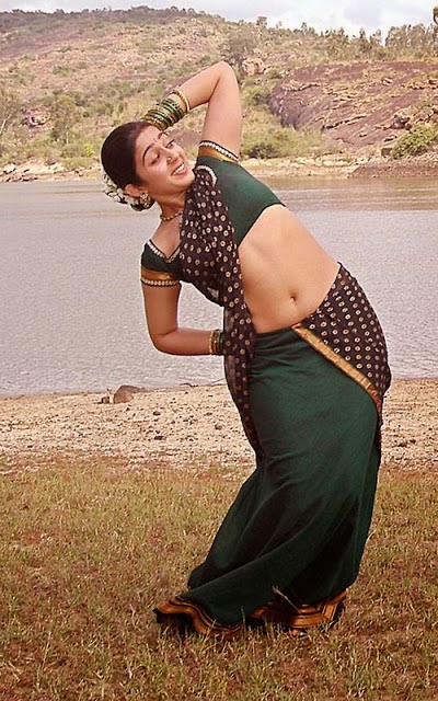 Charmi Kaur : Charmi Kaur Biography, Height, Weight, Upcoming Films, Hot Unseen Pics in Skirt, mini skirts, swimsuit, bikini pics, charmi kaur latest Free Wallpapers HD quality charmi kaur exposing her hot big belly navel show in green saree hot pics