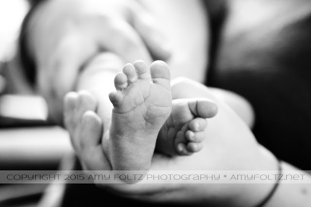 black and white close up photo of baby feet