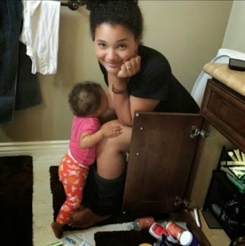 Viral picture of mum breastfeeding baby from the closet Viral picture of mum breastfeeding baby from the closet