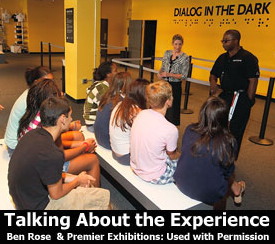A photograph of a discussion group at the completion of a Dialogue in the Dark tour. Credit: Ben Rose and Premier Exhibitions. Used with permission.