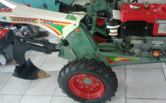 Mesin traktor tangan bajak sawah