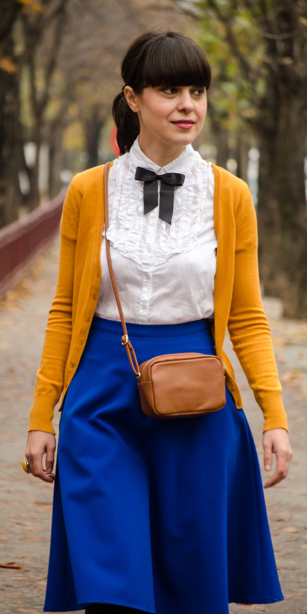 preppy school outfit mustard sweater cobalt blue skirt brown high heels brown satchel h&m c&a poema