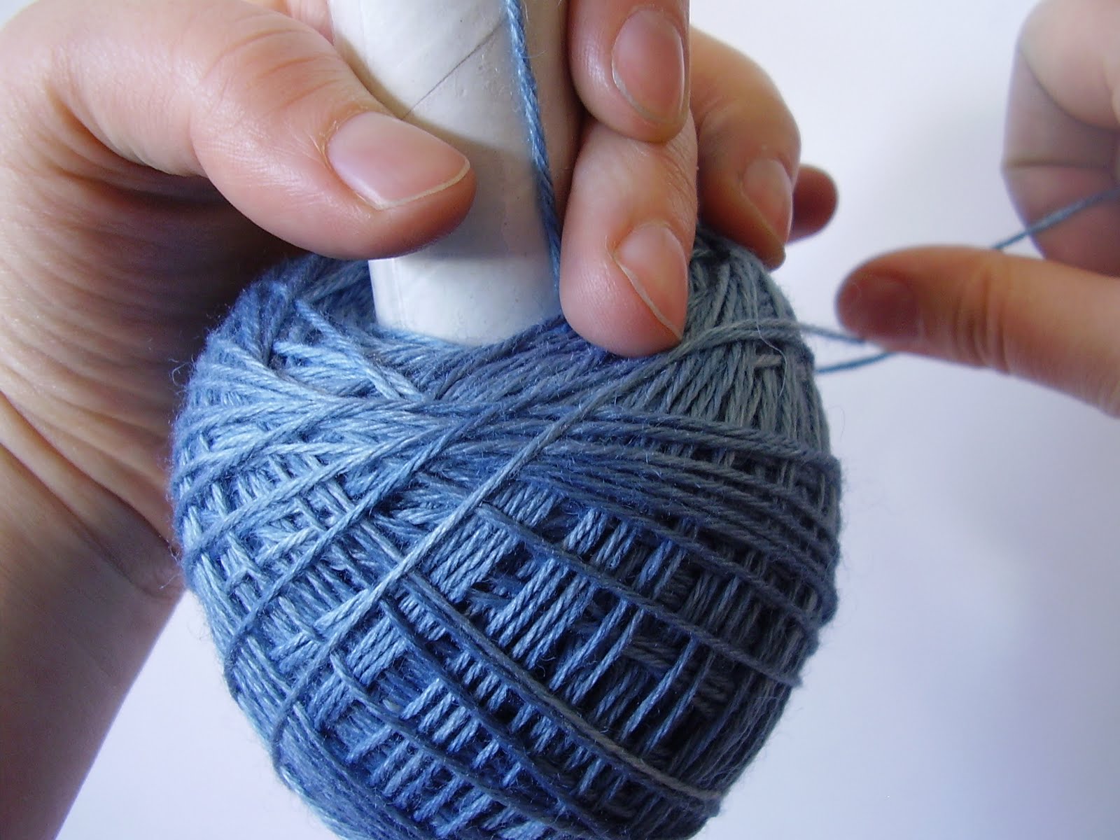 Winding yarn by hand
