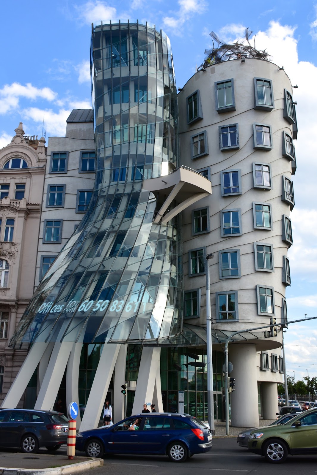 In the Dancing House, Ginger leans into Fred