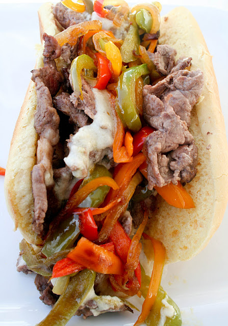 Philly Cheese Steak Sandwich with Provolone Sauce ohsweetbasil.com Philly Cheese Steak Sandwich with Provolone Sauce ohsweetbasil.com