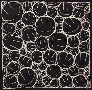 happy stitch free motion quilting design