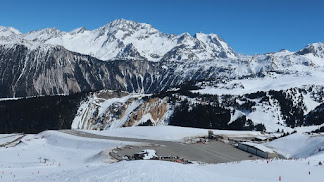 Skiing down to Courchevel Altiport