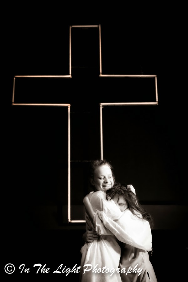 Hugging God Performance Art Dance: God Communes with man, God hugs man, God embraces man, Man is led by the Holy Spirit, Banner, the enemy has been defeated, Experience Arts School, In the Light Photography