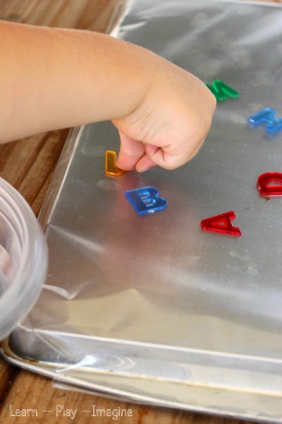 Boost fine motor skills and work on letter recognition with a sticky alphabet tray.