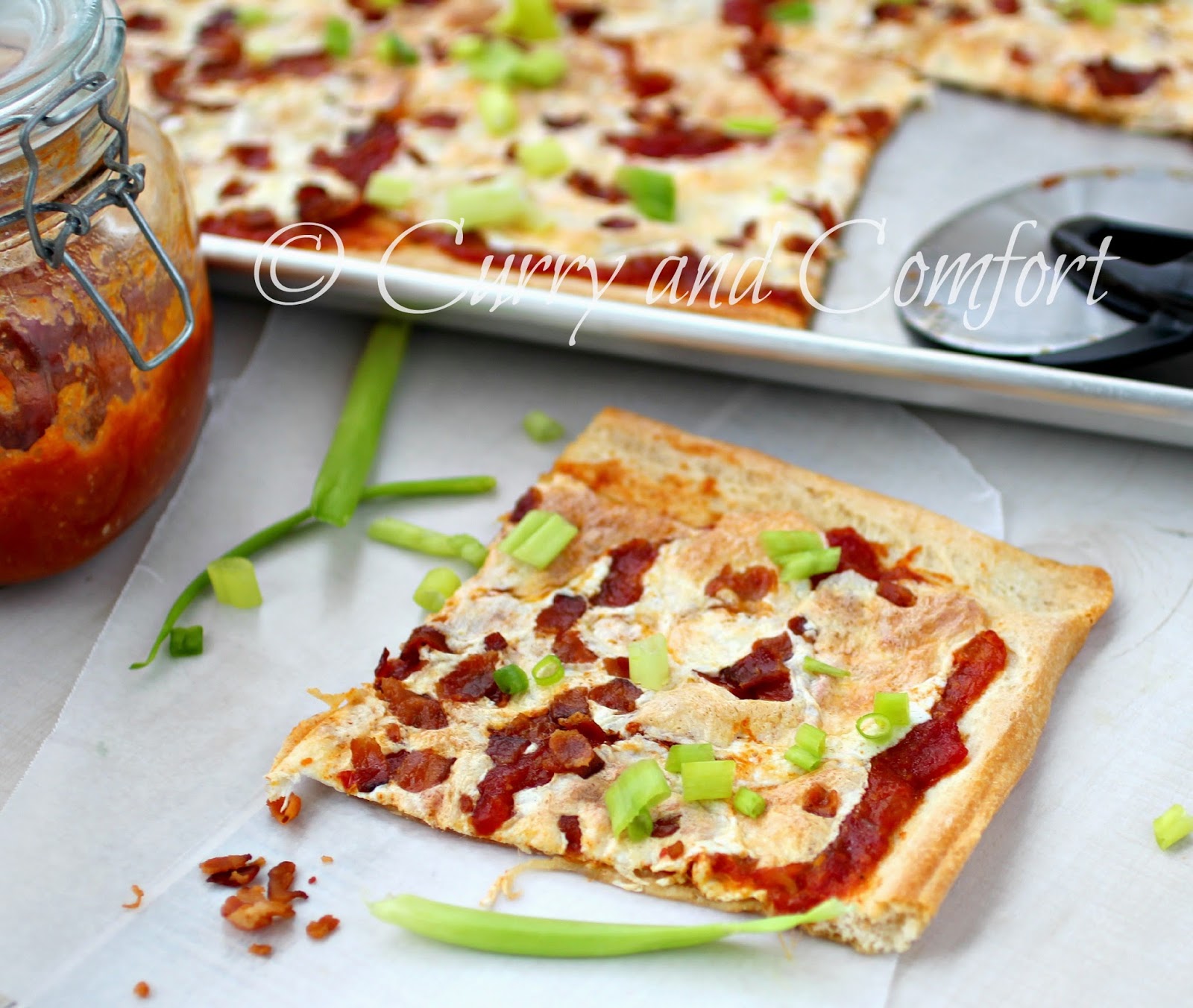 Kitchen Simmer Bacon and Tomato Mango Jam Pizza