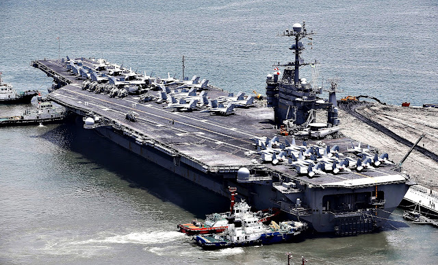 Twenty-one of those vessels are homeported in Japan, with an additional destroyer expected to homeport at Yokosuka by 2017 USS George Washington (CVN 73) in Yokosuka