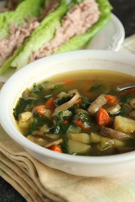 vitamin vegetable soup with carrots, parsnips, celery, mushrooms and spinach