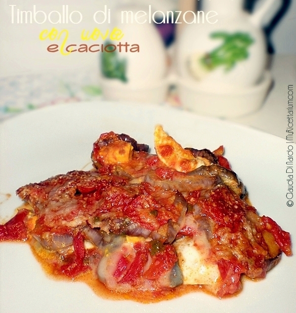 timballo di melanzane con uova e caciotta