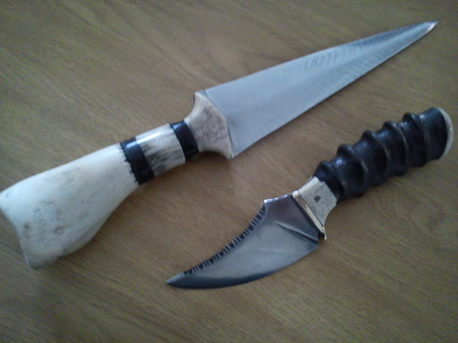 Tribal dagger and bearclaw skinner