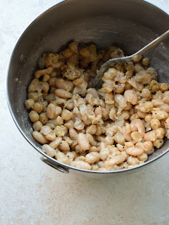 Roughly mashed beans with dressing....I've used cannellini beans and chickpeas here Pan Bagnat (White Bean Niçoise Salad Sandwich)