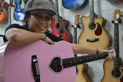 Me holding the pink guitar Photographed by Clemen