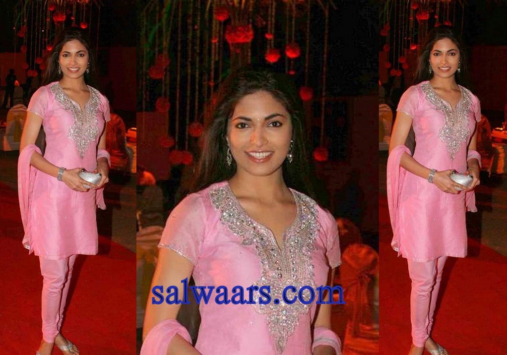 Bollywood celebrity spotted with light pink silk short sleeves kameez and