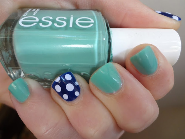 turquoise and caicos, navy polka dot accent nail
