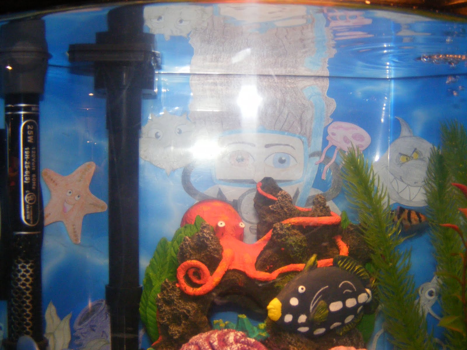 Think Tank Mom Make your own custom fish tank backdrop.