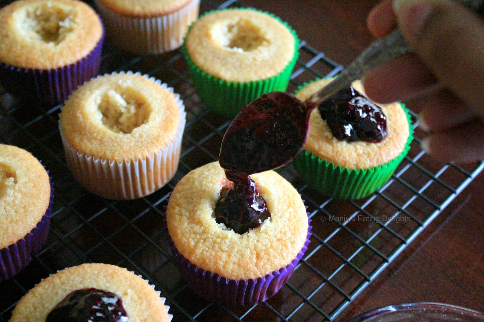 Manju's Eating Delights Vanilla Cupcakes with mixed Berry compote filling