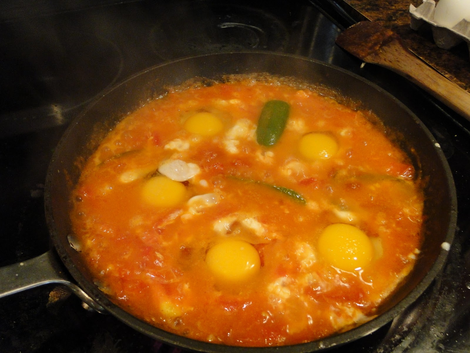 The Libyan Kitchen Shakshooka Eggs in tomato stew