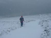 Cameron Speirs: http://scotlandinview.com/2011/02/13/mountain/the-most-easterly-munro/attachment/plodding-through-the-snow-showers-on-the-descent-of-mount-keen/