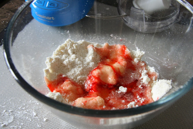 sifted and processed almond meal and powdered sugar with coloured egg whites on top. 